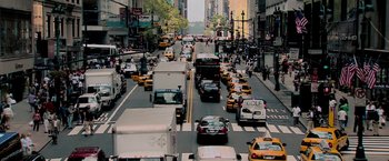 Movie still from “Surrogates” (2009), directed by Jonathan Mostow – A busy city street filled with lots of traffic; Extreme Wide shot, High angle