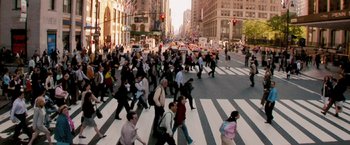 Movie still from “Surrogates” (2009), directed by Jonathan Mostow – A large group of people crossing the street; Extreme Wide shot, High angle