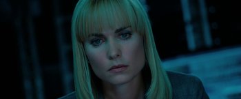 Movie still from “Surrogates” (2009), directed by Jonathan Mostow – A person with long blonde hair; Close Up shot, Low angle