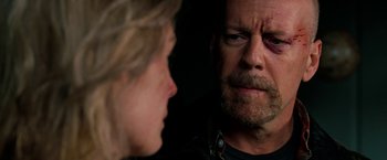 Movie still from “Surrogates” (2009), directed by Jonathan Mostow – A man and woman looking at each other with a bruised eye; Close Up shot, Over the shoulder angle