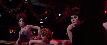 Movie still from “Sweet Charity” (1969), directed by Bob Fosse – A group of women sitting on top of each other; Medium shot, Low angle