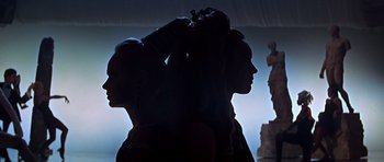 Movie still from “Sweet Charity” (1969), directed by Bob Fosse – Two people standing next to each other in the dark; Close Up shot, Low angle