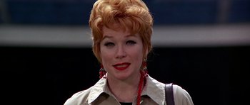 Movie still from “Sweet Charity” (1969), directed by Bob Fosse – A person wearing a jacket; Close Up shot, Low angle