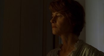 Movie still from “Swimming Pool” (2003), directed by François Ozon – A person looking up at the sky; Close Up shot, Low angle