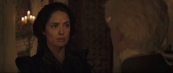 Movie still from “Tale of Tales” (2015), directed by Matteo Garrone – A woman is looking at a man in a dark room; Close Up shot, Over the shoulder angle