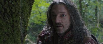 Movie still from “Tale of Tales” (2015), directed by Matteo Garrone – A person with long grey hair; Close Up shot, Low angle