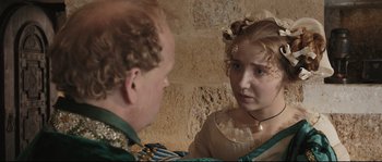 Movie still from “Tale of Tales” (2015), directed by Matteo Garrone – A man and a woman are looking at each other; Close Up shot, Over the shoulder angle