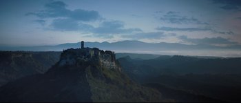 Movie still from “Tale of Tales” (2015), directed by Matteo Garrone – A view of a small town on top of a mountain; Extreme Wide shot, Low angle