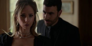 Movie still from “Ted Lasso” (2020), created by Brendan Hunt – A man and a woman standing next to each other; Close Up shot, Over the shoulder angle