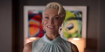 Movie still from “Ted Lasso” (2020), created by Brendan Hunt – A woman with blonde hair wearing a blue top; Close Up shot, Over the shoulder angle