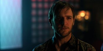Movie still from “Altered Carbon” (2018), created by Laeta Kalogridis – A person wearing a shirt; Close Up shot, Over the shoulder angle