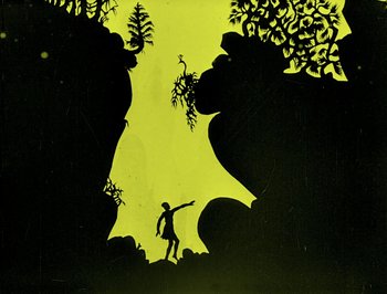 Movie still from “The Adventures of Prince Achmed” (1926), directed by Lotte Reiniger – Silhouette of a man pointing to a forest; Extreme Wide shot, Low angle