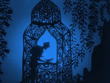 Movie still from “The Adventures of Prince Achmed” (1926), directed by Lotte Reiniger – A shadow of a person standing in a window; Wide shot, Low angle