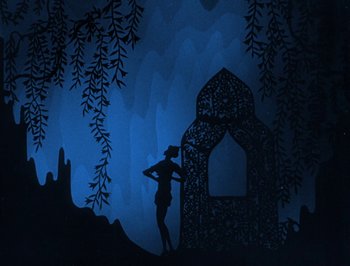 Movie still from “The Adventures of Prince Achmed” (1926), directed by Lotte Reiniger – A woman standing in front of a building at night; Wide shot, Low angle