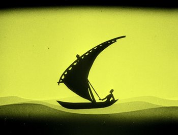 Movie still from “The Adventures of Prince Achmed” (1926), directed by Lotte Reiniger – A man sitting on a boat in the water; Extreme Wide shot, High angle