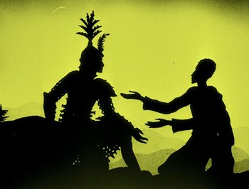 Movie still from “The Adventures of Prince Achmed” (1926), directed by Lotte Reiniger – A silhouette of a man and a woman in costume; Wide shot, Low angle