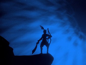Movie still from “The Adventures of Prince Achmed” (1926), directed by Lotte Reiniger – A silhouette of a person holding a bow and arrow; Wide shot, Low angle
