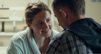 Movie still from “The Angels' Share” (2012), directed by Ken Loach – A man and a woman are looking at one another; Close Up shot, Over the shoulder angle
