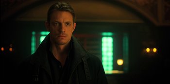 Movie still from “Altered Carbon” (2018), created by Laeta Kalogridis – A person wearing a jacket; Close Up shot, Low angle