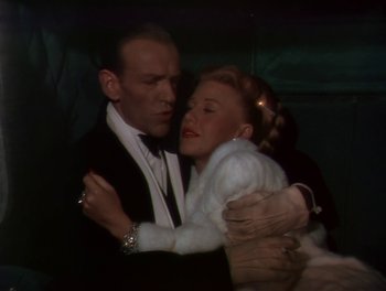 Movie still from “The Barkleys of Broadway” (1949), directed by Charles Walters – A man and a woman embracing each other; Medium shot, Low angle