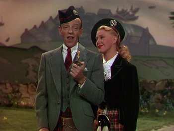 Movie still from “The Barkleys of Broadway” (1949), directed by Charles Walters – A man and a woman dressed in scottish garb; Medium shot, Low angle