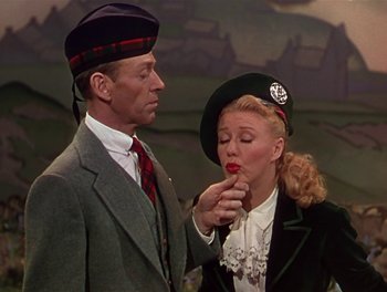 Movie still from “The Barkleys of Broadway” (1949), directed by Charles Walters – A man and a woman are standing next to each other; Medium shot, Low angle