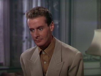 Movie still from “The Barkleys of Broadway” (1949), directed by Charles Walters – A person wearing a suit and tie; Close Up shot, High angle