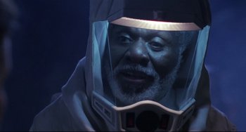 Movie still from “The Blob” (1988), directed by Chuck Russell – An older man wearing a space suit and a helmet; Close Up shot, Low angle