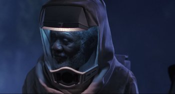 Movie still from “The Blob” (1988), directed by Chuck Russell – A man wearing a gas mask in a dark room; Close Up shot, Low angle