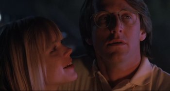 Movie still from “The Blob” (1988), directed by Chuck Russell – A man and a woman looking at each other; Close Up shot, Low angle