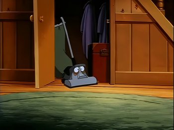 Movie still from “The Brave Little Toaster” (1987), directed by Jerry Rees – A picture of a room with a carpet and a vacuum; Wide shot, High angle