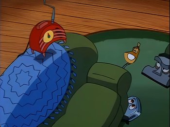 Movie still from “The Brave Little Toaster” (1987), directed by Jerry Rees – An image of a cartoon character on a couch; Wide shot, High angle
