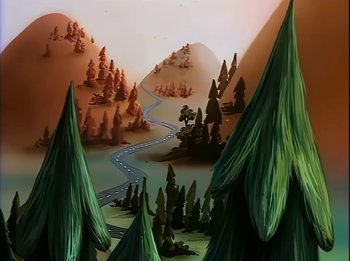 Movie still from “The Brave Little Toaster” (1987), directed by Jerry Rees – A view of a road through a valley with trees in the background; Extreme Wide shot, High angle