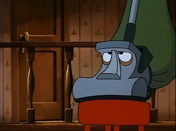 Movie still from “The Brave Little Toaster” (1987), directed by Jerry Rees – A cartoon character is sitting in a chair; Close Up shot, High angle
