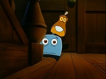 Movie still from “The Brave Little Toaster” (1987), directed by Jerry Rees – Two cartoon characters sitting on top of each other on a wooden floor; Wide shot, High angle