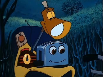 Movie still from “The Brave Little Toaster” (1987), directed by Jerry Rees – A cartoon of a blue and yellow train; Medium shot, Low angle