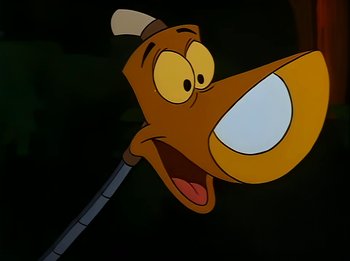 Movie still from “The Brave Little Toaster” (1987), directed by Jerry Rees – A cartoon of a dog with a stick in its mouth; Close Up shot, Low angle