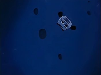 Movie still from “The Brave Little Toaster” (1987), directed by Jerry Rees – A blue sky with some black dots in the background; Close Up shot, Overhead angle