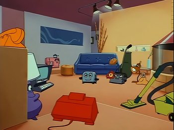 Movie still from “The Brave Little Toaster” (1987), directed by Jerry Rees – A cartoon room with a couch , a chair , a tv , a laptop , and a mouse; Wide shot, High angle