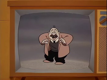 Movie still from “The Brave Little Toaster” (1987), directed by Jerry Rees – An animation of a man in a suit and tie; Medium shot, Low angle