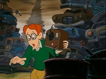Movie still from “The Brave Little Toaster” (1987), directed by Jerry Rees – A man holding a video camera in front of a bunch of cars; Medium shot, High angle