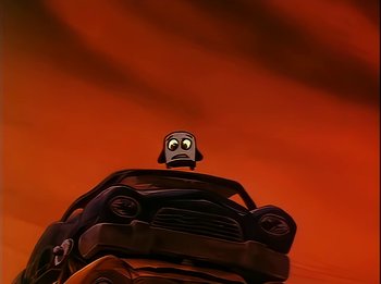 Movie still from “The Brave Little Toaster” (1987), directed by Jerry Rees – An animated car with a face on top of it; Close Up shot, Low angle