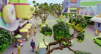 Movie still from “The Cat in the Hat” (2003), directed by Bo Welch – A street scene with people walking on the sidewalk; Extreme Wide shot, High angle