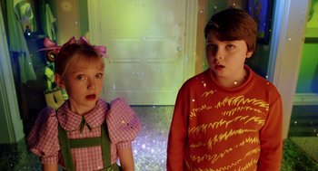 Movie still from “The Cat in the Hat” (2003), directed by Bo Welch – Two children standing in front of a door; Medium shot, High angle