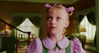Movie still from “The Cat in the Hat” (2003), directed by Bo Welch – A little girl in a pink and green dress; Close Up shot, Over the shoulder angle