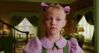 Movie still from “The Cat in the Hat” (2003), directed by Bo Welch – A little girl in a purple dress with two bows on her head; Close Up shot, High angle