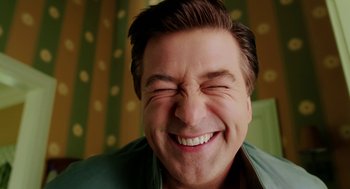 Movie still from “The Cat in the Hat” (2003), directed by Bo Welch – A person smiling with his eyes closed; Close Up shot, Overhead angle