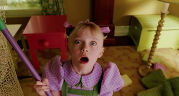 Movie still from “The Cat in the Hat” (2003), directed by Bo Welch – A little girl with a surprised look on her face; Close Up shot, High angle