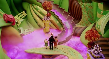 Movie still from “The Cat in the Hat” (2003), directed by Bo Welch – A group of people standing next to each other in a room; Extreme Wide shot, High angle