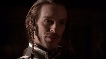 Movie still from “The Duellists” (1977), directed by Ridley Scott – A person with long hair; Close Up shot, Low angle